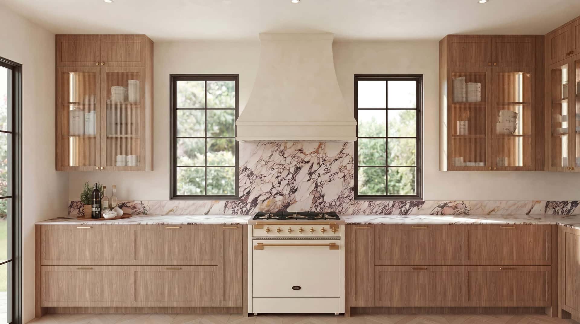 A kitchen on the boards: bookmatched marble backsplash.
