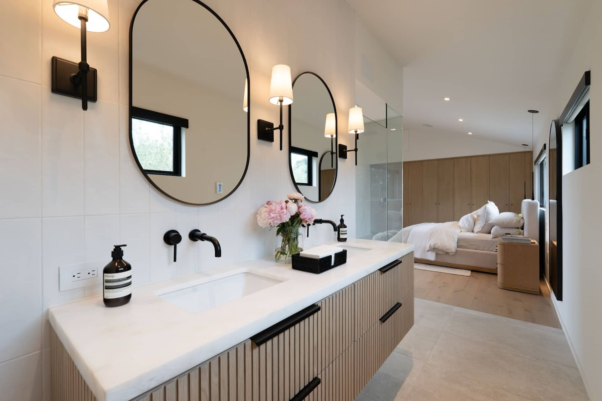 The Padaro Lane primary bath, open to the bedroom beyond.