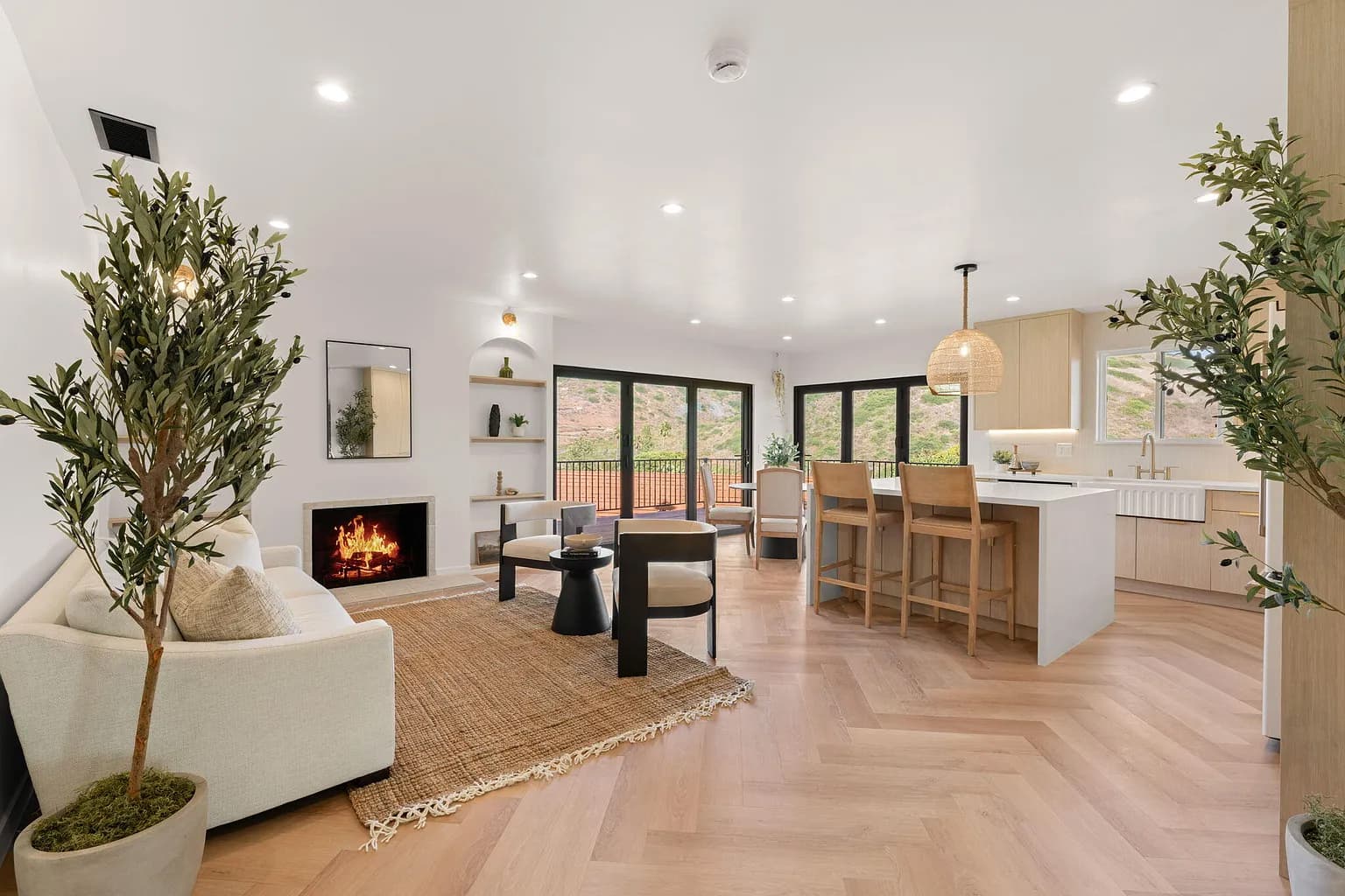 An open oak living space in Campanil, built by DHRH Construction.
